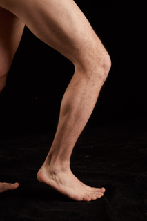 Jamie  1 calf flexing nude side view 0008.jpg